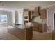 A kitchen featuring an island and granite countertops ready to become the heart of the home at 240 Jay Trl, Fayetteville, GA 30215