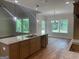 Open concept living room with hardwood floors and lots of natural light at 240 Jay Trl, Fayetteville, GA 30215