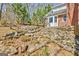 View of the backyard landscaping and exterior wall of the home at 150 Gill Ln, Stockbridge, GA 30281