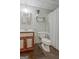 Basement bathroom featuring wood-look floor and neutral walls at 150 Gill Ln, Stockbridge, GA 30281