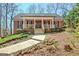 Beautiful brick home with a welcoming front porch, perfect for enjoying the outdoors at 150 Gill Ln, Stockbridge, GA 30281