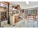 Kitchen featuring stainless steel appliances, island cooktop, breakfast nook, and wood cabinetry at 150 Gill Ln, Stockbridge, GA 30281