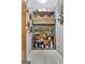 Walk-in pantry with wood shelves and ample storage space for kitchen essentials at 150 Gill Ln, Stockbridge, GA 30281