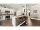 Stylish kitchen with granite countertops, stainless steel appliances, and bar stool seating at 2715 Ivey Crossing Trl, Cumming, GA 30041
