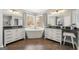 Lovely main bathroom featuring soaking tub and dual sink vanities with granite counters at 2715 Ivey Crossing Trl, Cumming, GA 30041