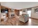 Inviting living room with stone fireplace, hardwood floors, and built-in bookshelves at 2585 Braselton Hwy, Buford, GA 30519