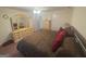 Carpeted bedroom with furniture, ceiling fan and standard closet at 5700 Thrasher Sw Ln, Conyers, GA 30094
