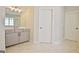 Vanity with drawers in bathroom plus doors to rooms on right side of picture at 446 Bandon Way, Peachtree City, GA 30269