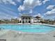 Inviting community pool with plenty of space for swimming and lounging on sunny days at 446 Bandon Way, Peachtree City, GA 30269