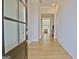 Bright foyer with hardwood flooring leading into an open-concept living space at 446 Bandon Way, Peachtree City, GA 30269
