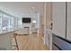Living room open concept view, fireplace, staircase, and kitchen at 446 Bandon Way, Peachtree City, GA 30269