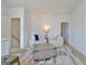 Bright living room boasts comfortable seating, a wooden coffee table, and hardwood floors at 446 Bandon Way, Peachtree City, GA 30269