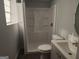 Bathroom features a shower stall, neutral colors, modern vanity, and a toilet at 938 King James Dr, Morrow, GA 30260