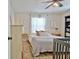 Bright bedroom with natural light, decorative rug, and a ceiling fan at 1120 Minix Rd, Sharpsburg, GA 30277