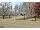 Charming home featuring a fenced yard and mature trees at 1120 Minix Rd, Sharpsburg, GA 30277