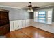 Bright bedroom with natural light, wood floors and wainscoting at 121 Flat Rock Rd, Villa Rica, GA 30180