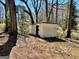 Outdoor storage shed situated on a wooded lot at 121 Flat Rock Rd, Villa Rica, GA 30180