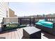 Outdoor deck area featuring outdoor furniture, perfect for relaxation and entertaining at 1127 Lehavre Ct, Hampton, GA 30228