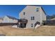 Large backyard features a multi-tiered deck and space for recreation at 1127 Lehavre Ct, Hampton, GA 30228
