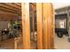 Partially finished basement with exposed framing and storage shelving at 1127 Lehavre Ct, Hampton, GA 30228