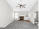 Spacious living room featuring a fireplace, neutral walls, and plenty of natural light for a cozy feel at 75 Heatherstone Way, Covington, GA 30016