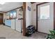 Laundry area with blue cabinets, a utility sink and an exterior door at 2940 E Lake Road, Mcdonough, GA 30252