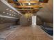 Unfinished attic featuring exposed beams, ductwork, and ladder access, ready for customization at 3860 Bays Ferry Trl, Marietta, GA 30062