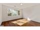 Sunny bedroom with hardwood floors offers a bright and airy feel and large windows at 3860 Bays Ferry Trl, Marietta, GA 30062