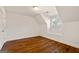 Bright bedroom features hardwood floors, natural light from the window, and neutral paint at 3860 Bays Ferry Trl, Marietta, GA 30062