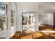 Living room with hardwood floors, view of a patio, and glass paneled doors at 3860 Bays Ferry Trl, Marietta, GA 30062