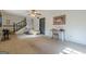 Spacious bedroom featuring a cozy bed, desk area, and staircase access at 3006 Deshong Dr, Stone Mountain, GA 30087