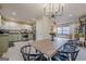 Bright eat-in kitchen boasts stainless appliances and seamless flow into the living area at 3006 Deshong Dr, Stone Mountain, GA 30087