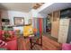 A colorful basement living area with an assortment of seating and vibrant decor at 1972 Cox Dr, Austell, GA 30168