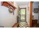 Welcoming entryway featuring decorative tile floor and charming entryway decor at 1972 Cox Dr, Austell, GA 30168