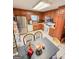 Functional kitchen area with stainless steel appliances and tile floors at 1972 Cox Dr, Austell, GA 30168