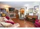 Spacious living room featuring hardwood floors, fireplace, and plenty of natural light at 1972 Cox Dr, Austell, GA 30168