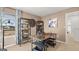 Office space featuring a wooden desk, vintage clock, and shelving at 201 Friendship Oak Way, Hampton, GA 30228