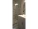 Bathroom showcasing a glass-enclosed shower with marble tiles and a neutral vanity at 2085 Dellwood Pl, Decatur, GA 30032