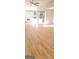 Open-concept living and kitchen area featuring newly installed hardwood floors at 2085 Dellwood Pl, Decatur, GA 30032
