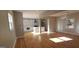 Bright living room with hardwood floors, recessed lighting and view of modern, updated kitchen at 2085 Dellwood Pl, Decatur, GA 30032