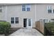 Backyard features a patio and door leading into the home at 102 Ellis Dr, Conyers, GA 30012