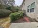 Backyard with bushes and air conditioner at 102 Ellis Dr, Conyers, GA 30012