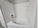 Full bathroom with a soaking tub and a shower combo at 102 Ellis Dr, Conyers, GA 30012