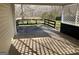 View of the back patio and its fence at 328 Cattlemans Cir, Mcdonough, GA 30252