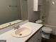 Traditional bathroom with a soaking tub and a single sink vanity at 328 Cattlemans Cir, Mcdonough, GA 30252