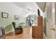 Bonus room with hardwood floors, ceiling fan, and exercise equipment at 2510 Shoreline Pkwy, Villa Rica, GA 30180