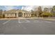 Exterior shot of the community clubhouse with ample parking and well maintained landscaping at 2510 Shoreline Pkwy, Villa Rica, GA 30180