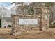 Charming stone sign for Mirror Lake Swim & Tennis Club, a community-oriented neighborhood at 2510 Shoreline Pkwy, Villa Rica, GA 30180