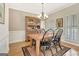 Bright dining area with hardwood floors, natural light, and classic furnishings at 2510 Shoreline Pkwy, Villa Rica, GA 30180