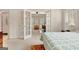 Bright main bedroom featuring a doorway leading to an office and a doorway leading outside at 2510 Shoreline Pkwy, Villa Rica, GA 30180